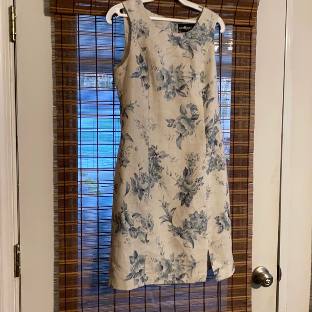 Sleeveless cream with blue flowered dress